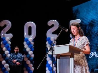 student speaking at podium